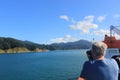 Photographer taking photo of islands Cook strait new zealand