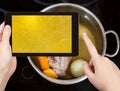 Tourist taking photo of boiling beef broth Royalty Free Stock Photo