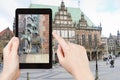 Tourist taking photo of Bremen Town Musicians