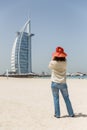 Tourist Taking Photo of The Burj Al Arab at Jumeirah Beach, Dubai Royalty Free Stock Photo