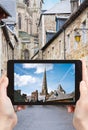 Tourist taking photo of Cathedral in Treguier Royalty Free Stock Photo