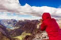 Tourist taking photo from Dalsnibba viewpoint Norway Royalty Free Stock Photo