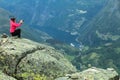 Tourist taking photo from Dalsnibba viewpoint Norway Royalty Free Stock Photo