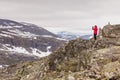 Tourist taking photo from Dalsnibba viewpoint Norway Royalty Free Stock Photo