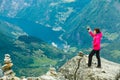 Tourist taking photo from Dalsnibba viewpoint Norway Royalty Free Stock Photo