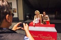 Tourist taking photo with Marilyn Monroe