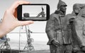 Tourist taking photo of Memorial in Anadyr town Royalty Free Stock Photo