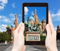 Tourist taking photo of Monument on red Square