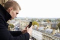 Tourist Taking Photo Of Oxford Skyline On Mobile Phone Royalty Free Stock Photo