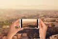 Tourist makes a photo of Panorama of Rome