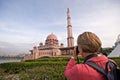 Tourist taking photo of Putra Mosque, Malaysia Royalty Free Stock Photo