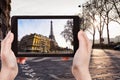 Tourist taking photo of Quay Branly in Paris