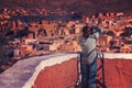 Tourist taking a photo of rural berber village Royalty Free Stock Photo