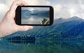 Tourist taking photo of Schliersee lake, Bavaria