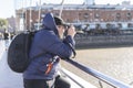 Tourist taking photos in Puerto Madero