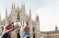 Tourist taking a picture of Milan Cathedral