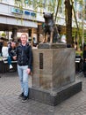 Tourist taking pictures with Hachiko Memorial statue