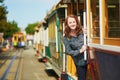 Tourist taking a ride in famous cable car in San Francisco Royalty Free Stock Photo