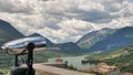 tourist telescope look at the city with a view of the mountains, close-up of binoculars on the background of the vantage