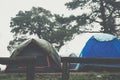 tourist tent in mist & fog. camping in forest. travel, vacation