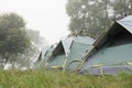 tourist tent in mist & fog. camping in forest. travel, vacation