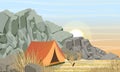 Tourist tent near the mountains. Tourism, camping and active mountain rest. Mountain range with stones and dry grass
