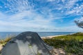 Tourist tents on the Baltic sea coast, camping on the sea coastline