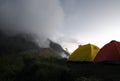 Tourist tents on the foggy mountain