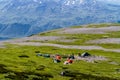 Tourist tents in the mountains, tourist camp in nature. Kamchatka Peninsula, Russia