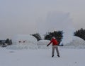 A tourist throwing hot water at winter park