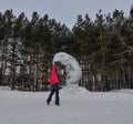 A tourist throwing hot water at winter park