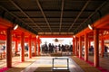 Tourist to see Floating torii gate of Itsukushima Shrine at Miyajima island