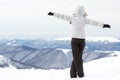 Tourist at the top of the mountain, symbol of freedom