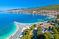 Tourist town of Selce and Poli Mora turquoise beach aerial view