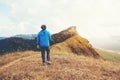 Tourist trail hiking in the forest Traveler Man crossing the mountain Traveler concept