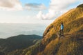 Tourist trail hiking in the forest Traveler Man Relax and crossing the mountain Traveler concept Royalty Free Stock Photo