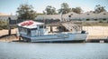 Tourist transport boats moored in the lagoons of the Ria Formosa Natural Park near the port of Tavira, portugal