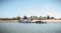 Tourist transport boats moored in the lagoons of the Ria Formosa Natural Park near the port of Tavira, portugal