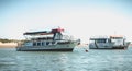 Tourist transport boats moored in the lagoons of the Ria Formosa Natural Park near the port of Tavira, portugal