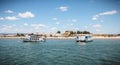 Tourist transport boats moored in the lagoons of the Ria Formosa Natural Park near the port of Tavira, portugal