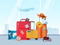 Tourist travel suitcases. Luggage and bags with map, camera and summer hat in airport. Tourism agency, adventure and