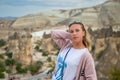 Tourist traveling in mountains cappadocia