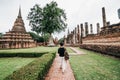 Tourist is traveling at Sukhothai Historical Park in Thailand Sukhothai historical park.