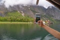 Tourist try to take photo shooting point by their smartphone in Lake Hallstatter