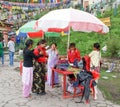 Tourist trying traditional ethnic costume at Ganeshtok, near Gangtok,Sikkim.