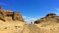 Tourist and Urho Ghost City, Xinjiang China