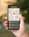 Tourist using map in cellphone to navigate and find hotel locations in big city, collage