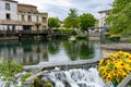Tourist and vacation destination, small Provencal town lIsle-sur-la-Sorgue with green water of Sotgue river Royalty Free Stock Photo