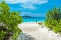 Tourist in vacation at Similan island is blue sky and clouds, blue sea and white sand beach, No.8 at Similan national park Royalty Free Stock Photo