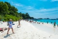 Tourist in vacation at Similan island is blue sky and clouds, blue sea and white sand beach Royalty Free Stock Photo